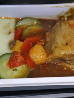 a white container with food in it