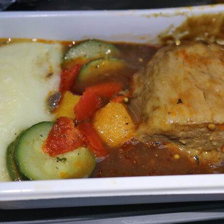 a white container with food in it