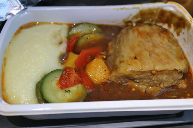 a white container with food in it