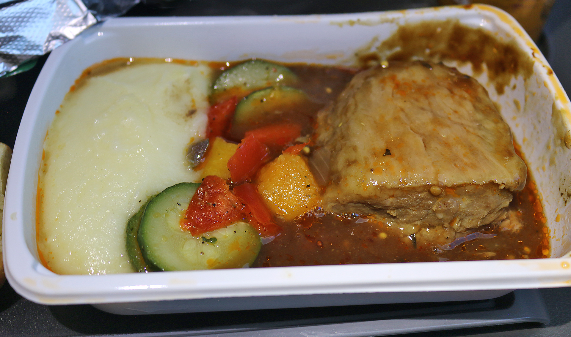 a white container with food in it