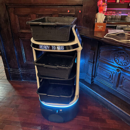 a cart with a few bins on it