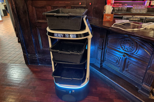 a cart with a few bins on it