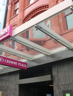 a glass awning over a building