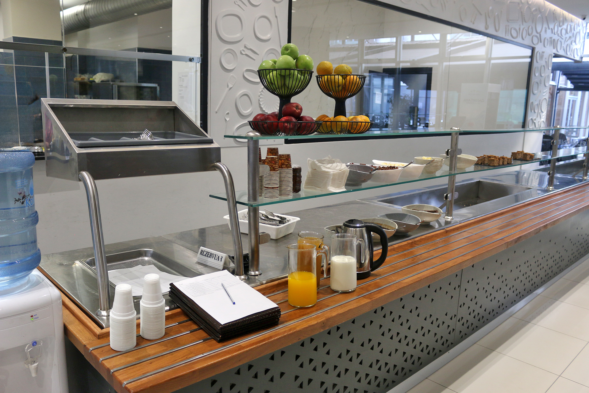 a counter with fruit and juice on it