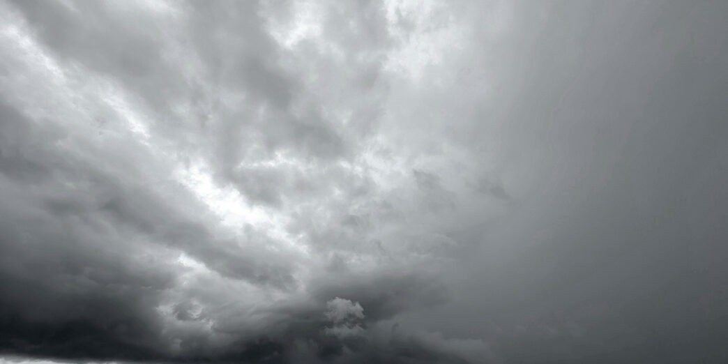 a storm clouds over the ocean