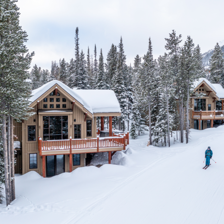 a person skiing down a snowy slope