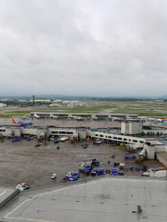 an airport with planes parked on the ground