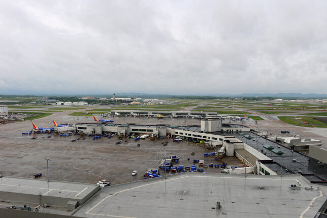 an airport with planes parked on the ground