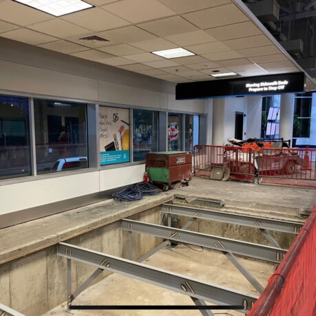 a building with a large hole in the ground