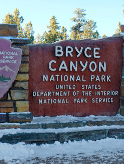 a sign at a entrance to a park