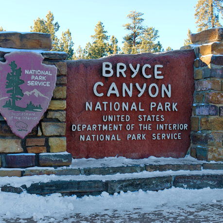 a sign at a entrance to a park