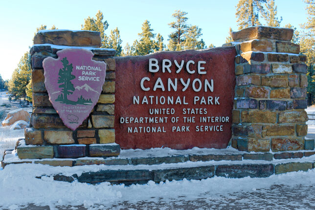 a sign at a entrance to a park