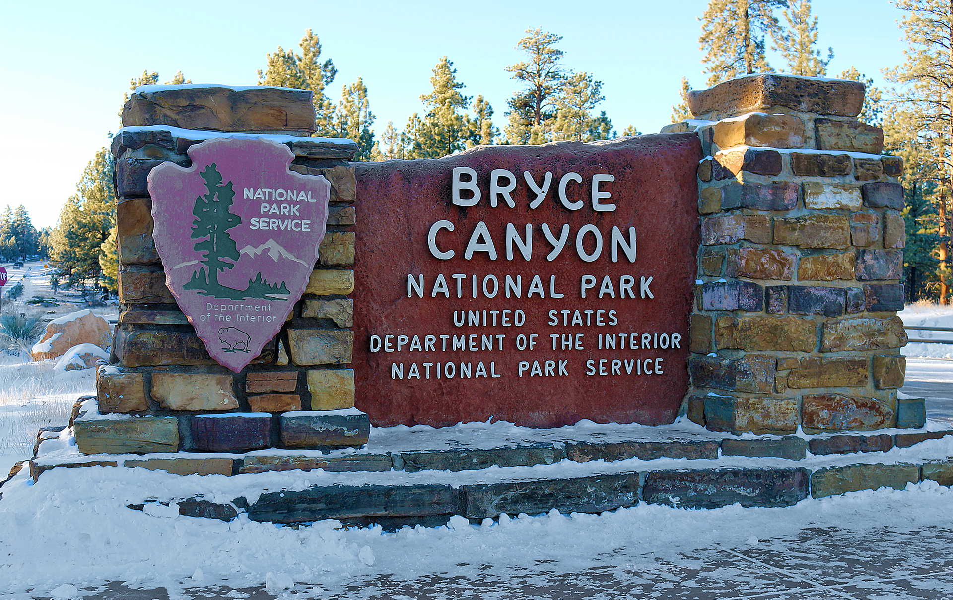 a sign at a entrance to a park