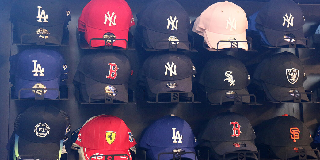a group of hats on a shelf