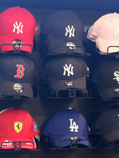 a group of hats on a shelf