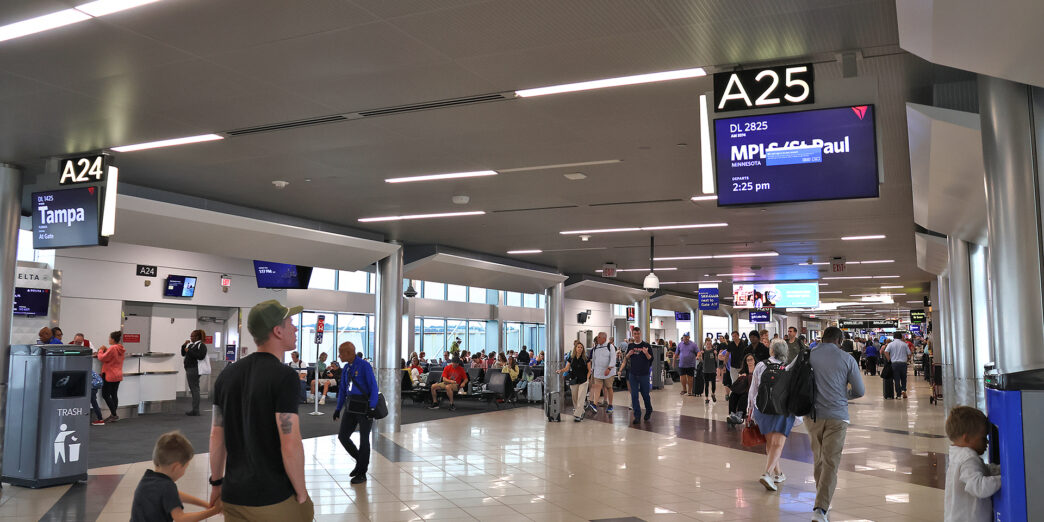 people walking in a terminal
