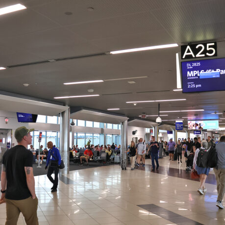 people walking in a terminal