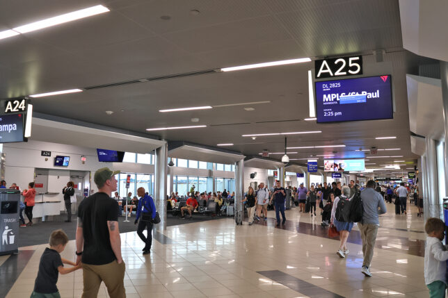 people walking in a terminal