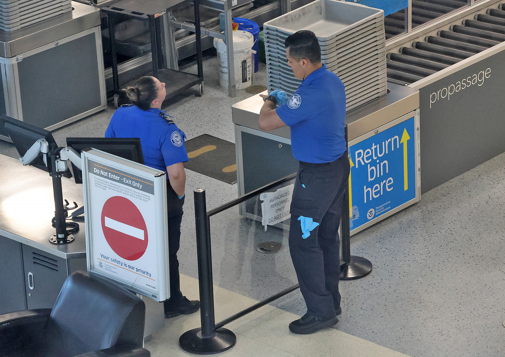 a man and woman standing in a line