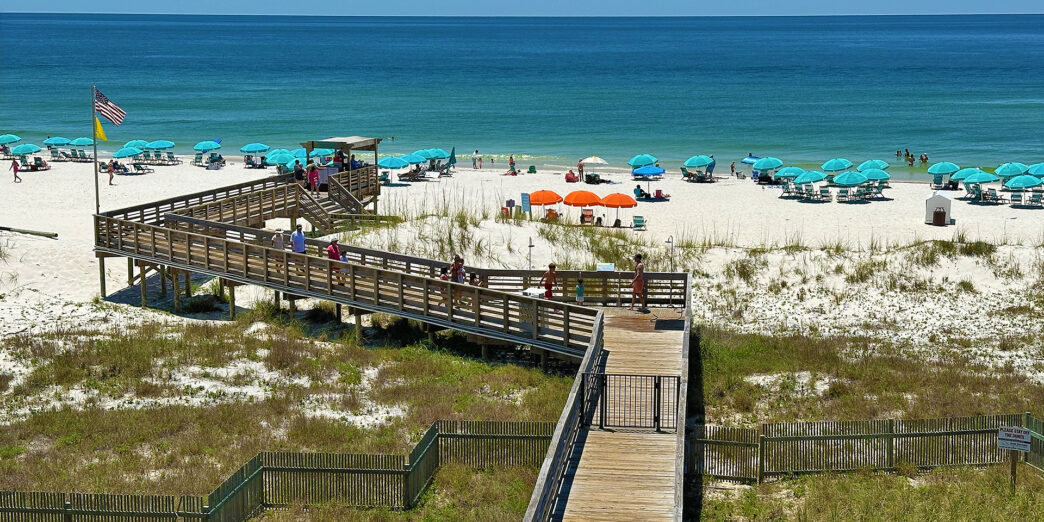 a boardwalk leading to a beach