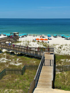 a boardwalk leading to a beach