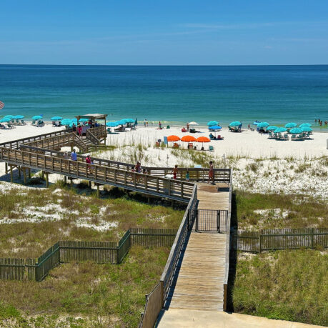 a boardwalk leading to a beach