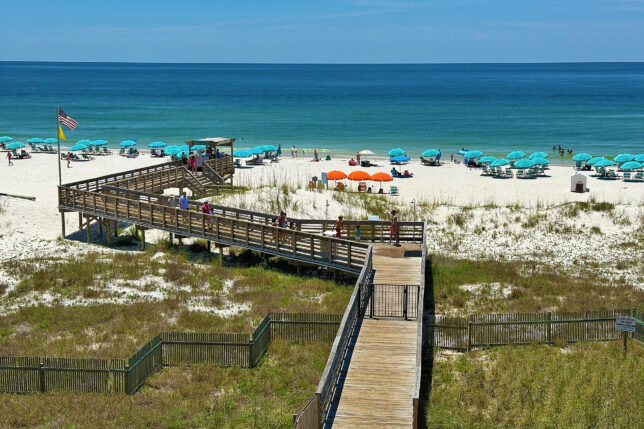a boardwalk leading to a beach