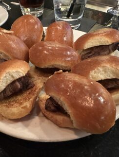 a plate of sandwiches on a table