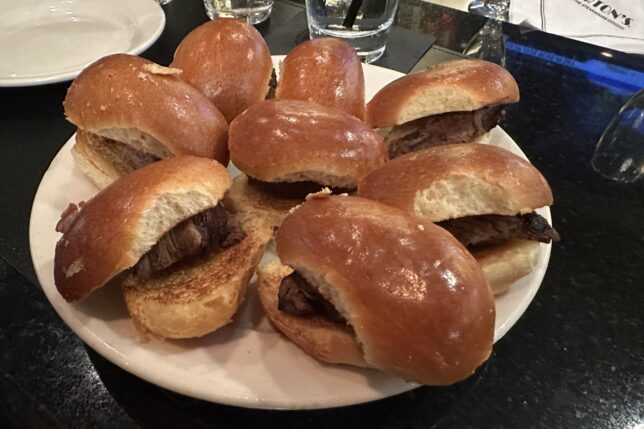 a plate of sandwiches on a table