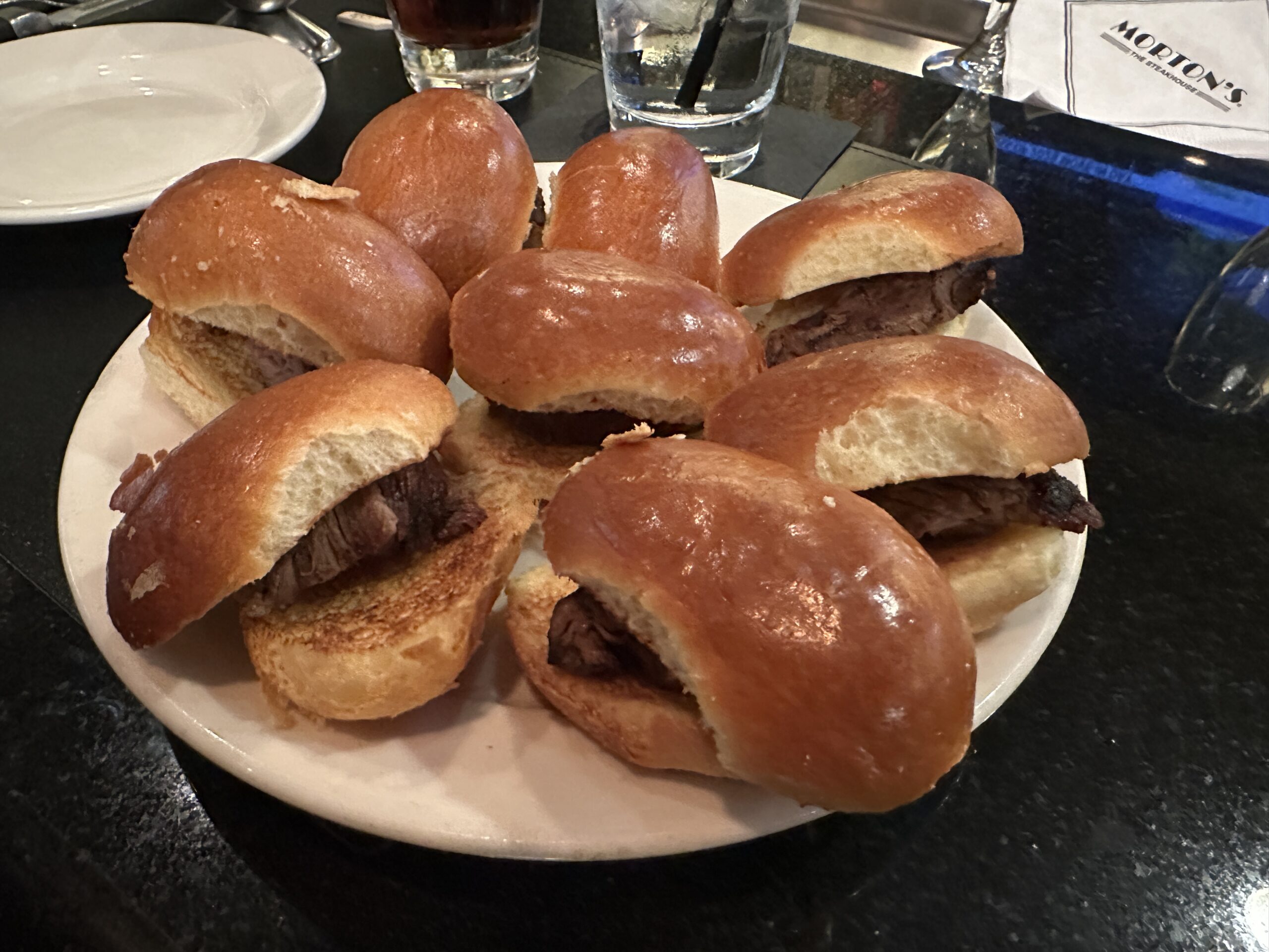 a plate of sandwiches on a table