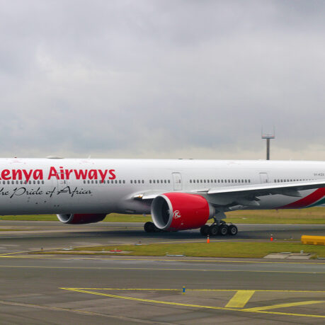 a large white airplane on a runway