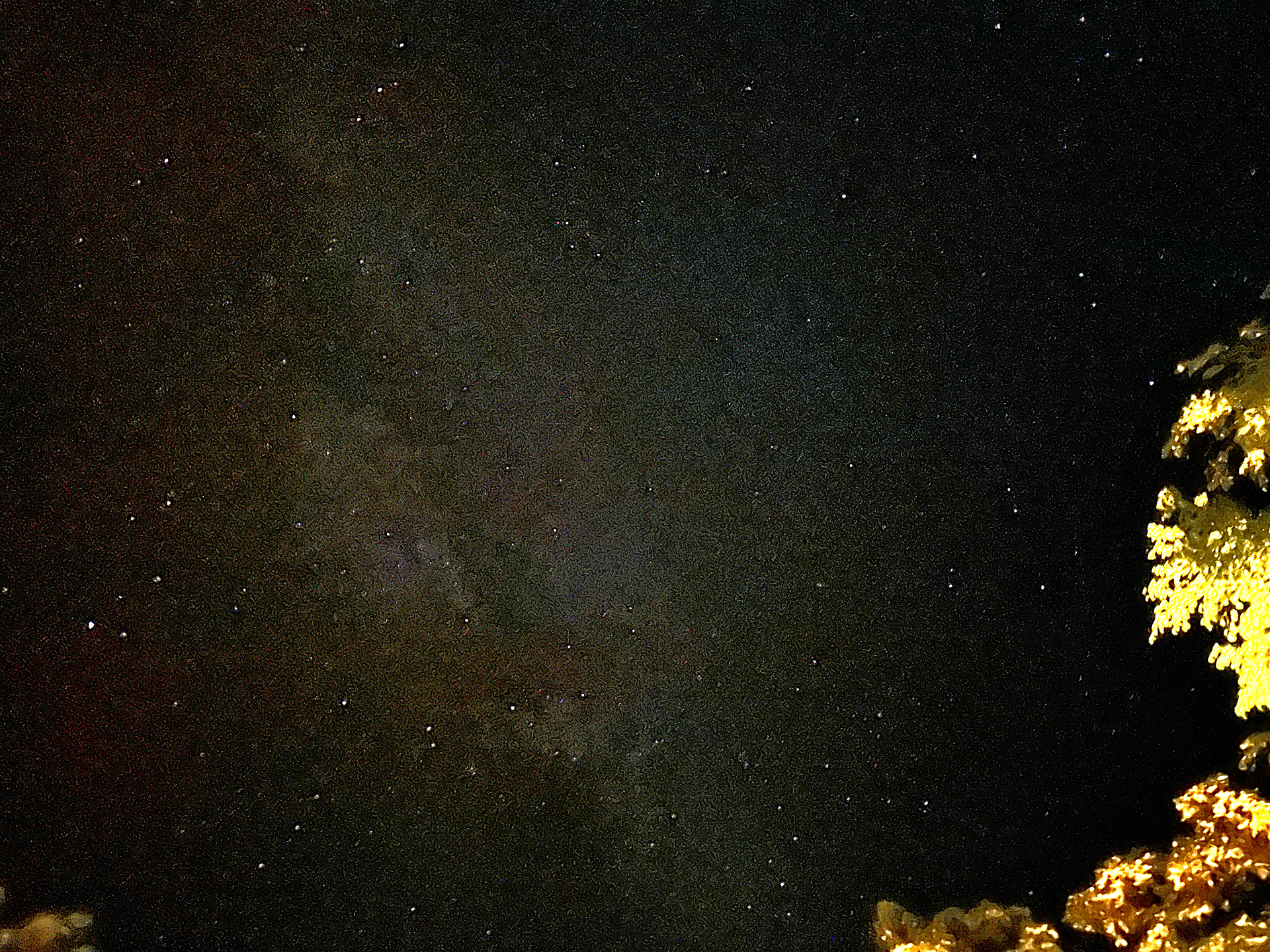 a night sky with stars and lights