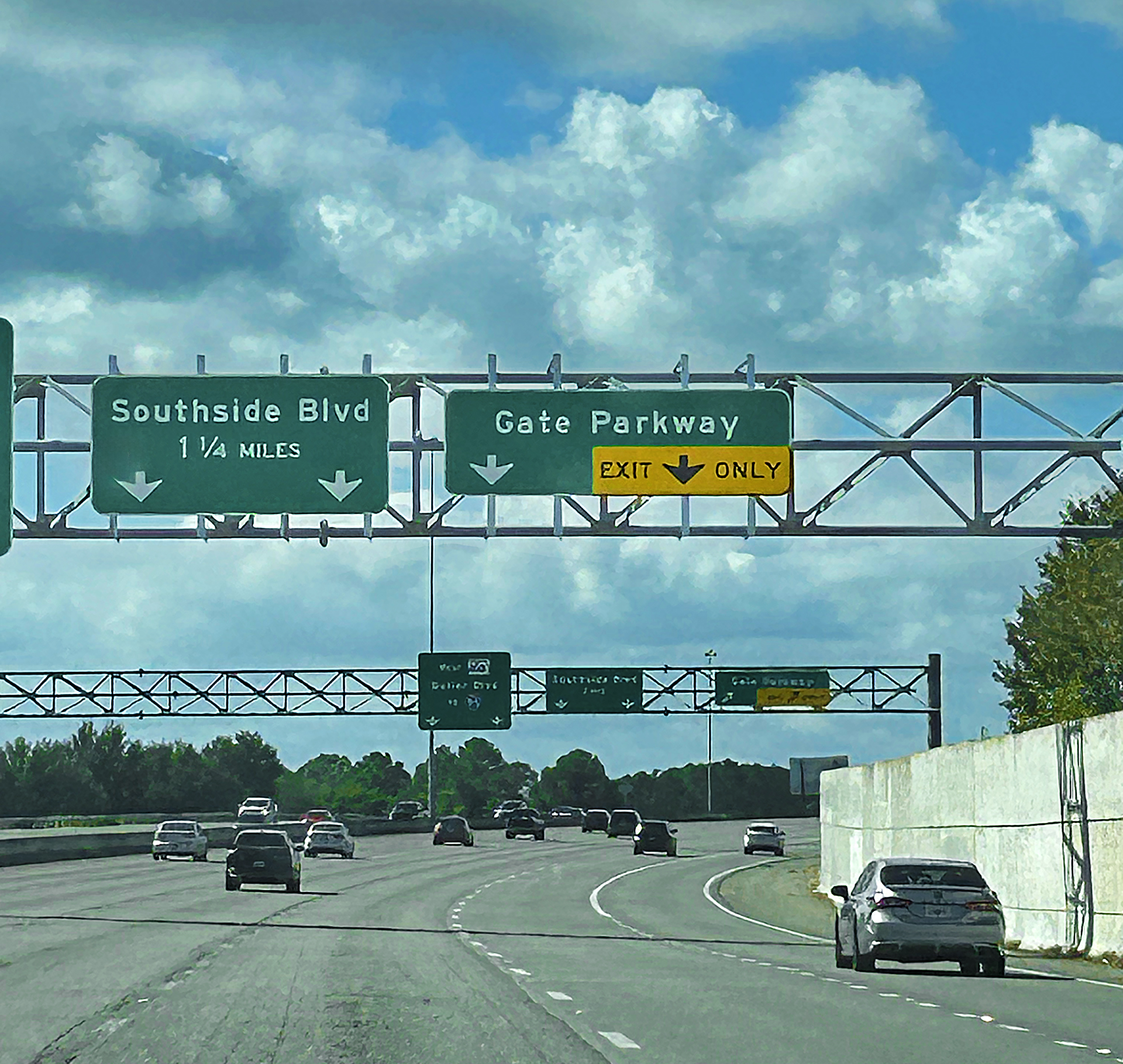 a highway with signs on it