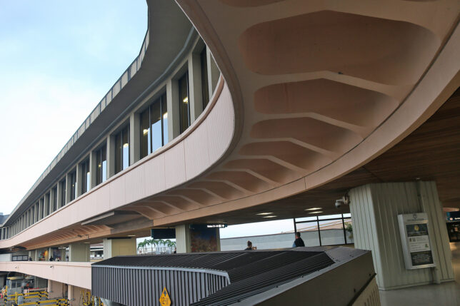a building with a curved roof