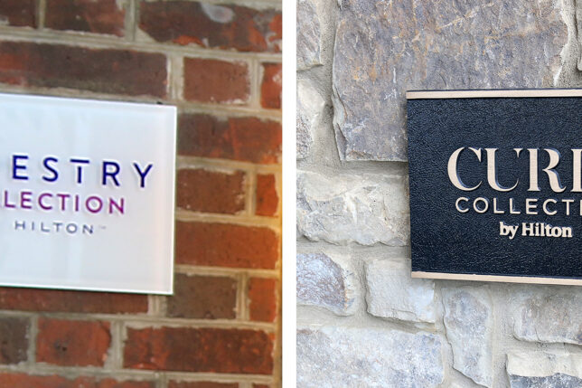 a sign on a brick wall