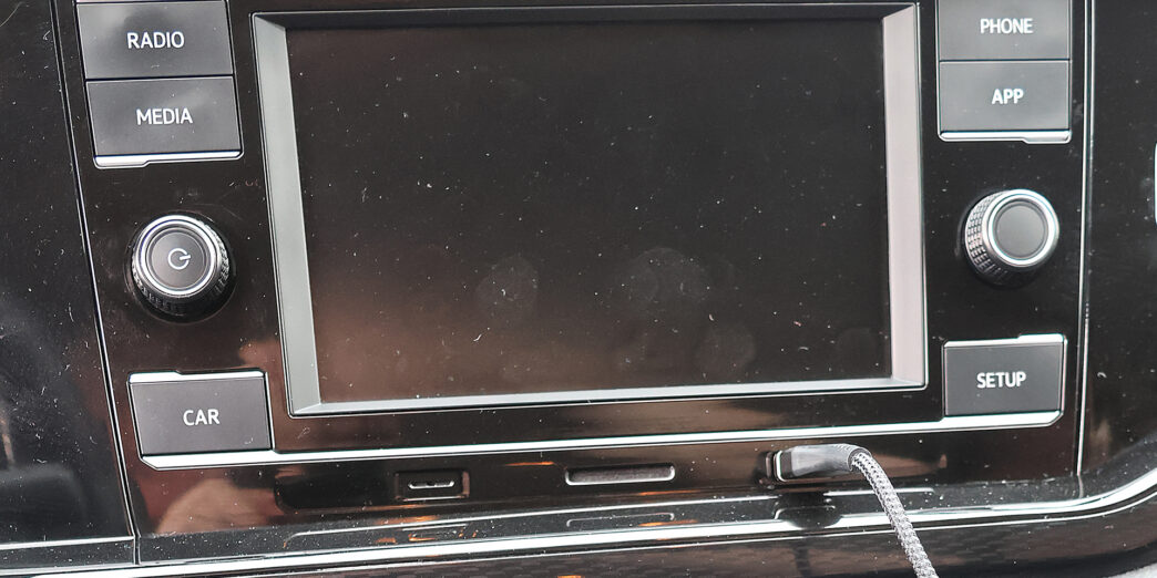 a car stereo with a screen and buttons