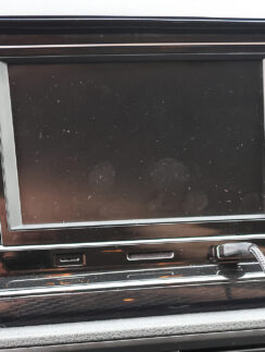 a car stereo with a screen and buttons