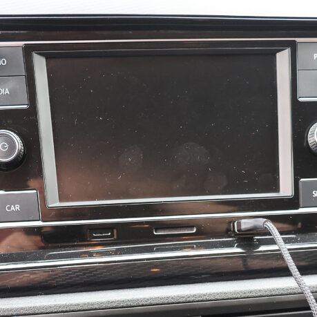 a car stereo with a screen and buttons