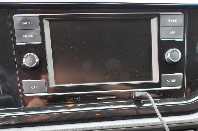 a car stereo with a screen and buttons