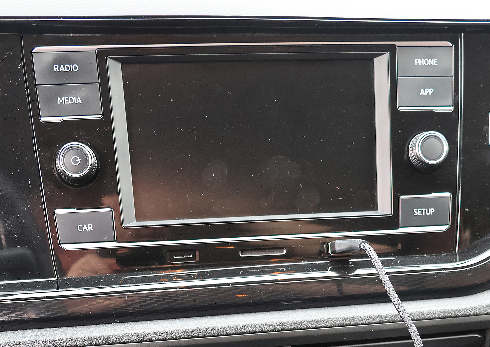 a car stereo with a screen and buttons