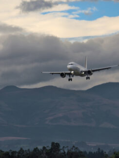 an airplane flying over mountains