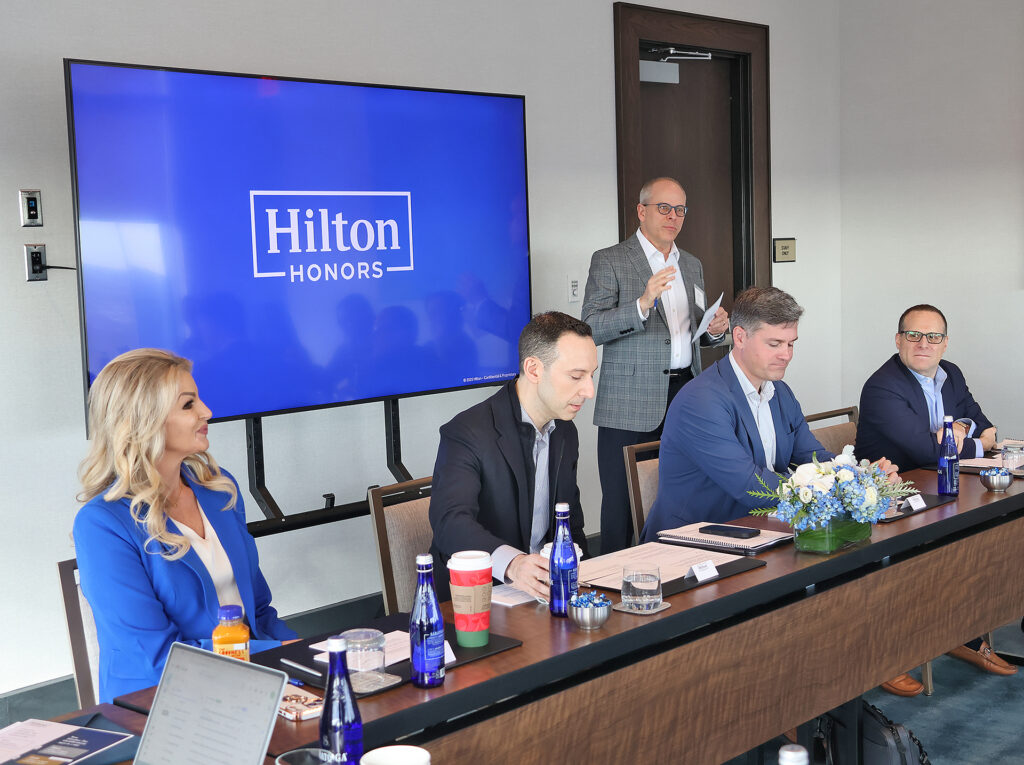 a group of people sitting at a table