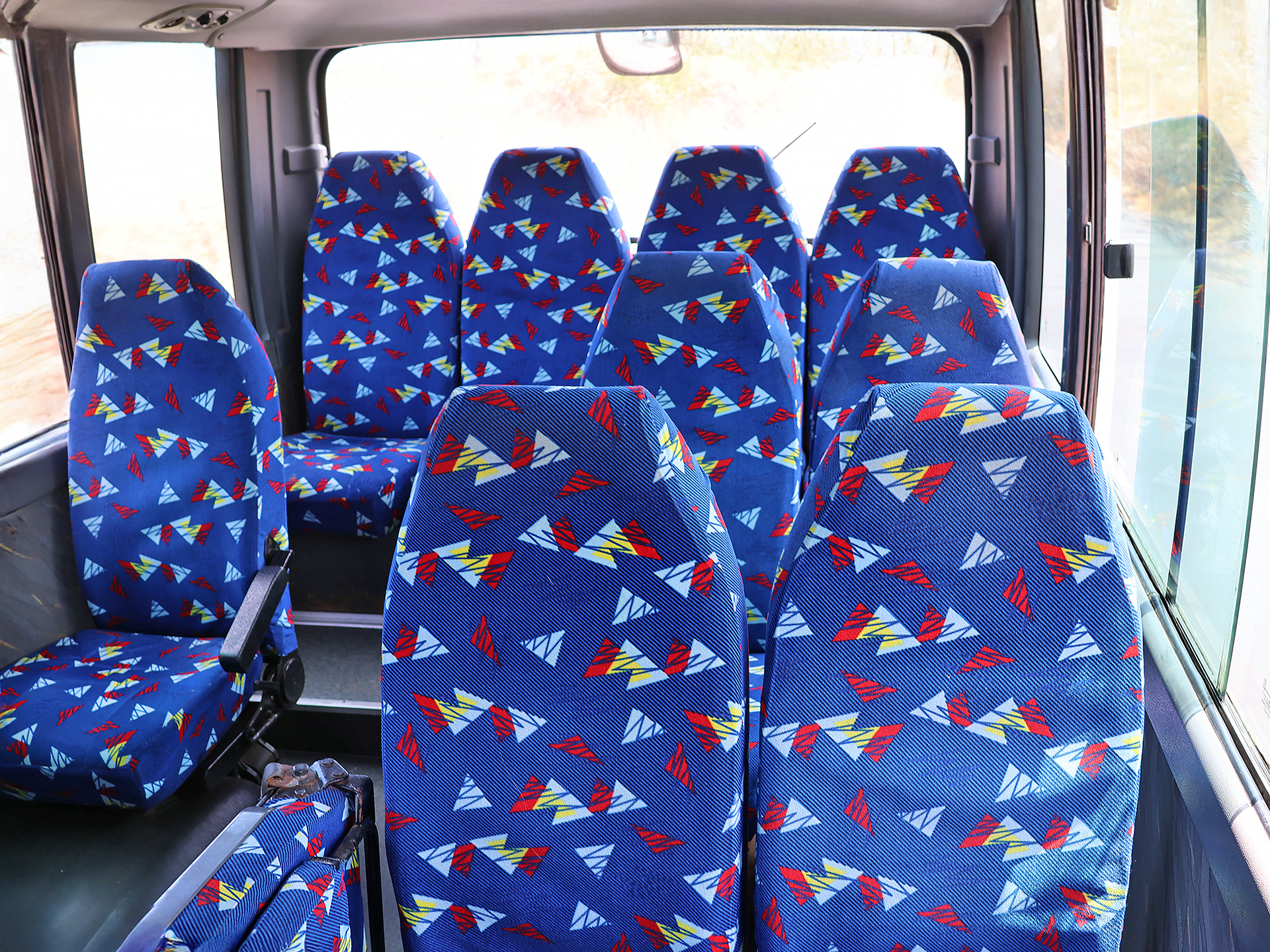 blue seats in a bus
