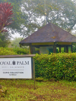 a sign in front of a building