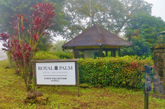 a sign in front of a building