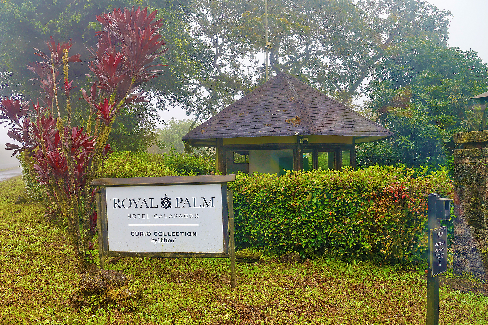a sign in front of a building