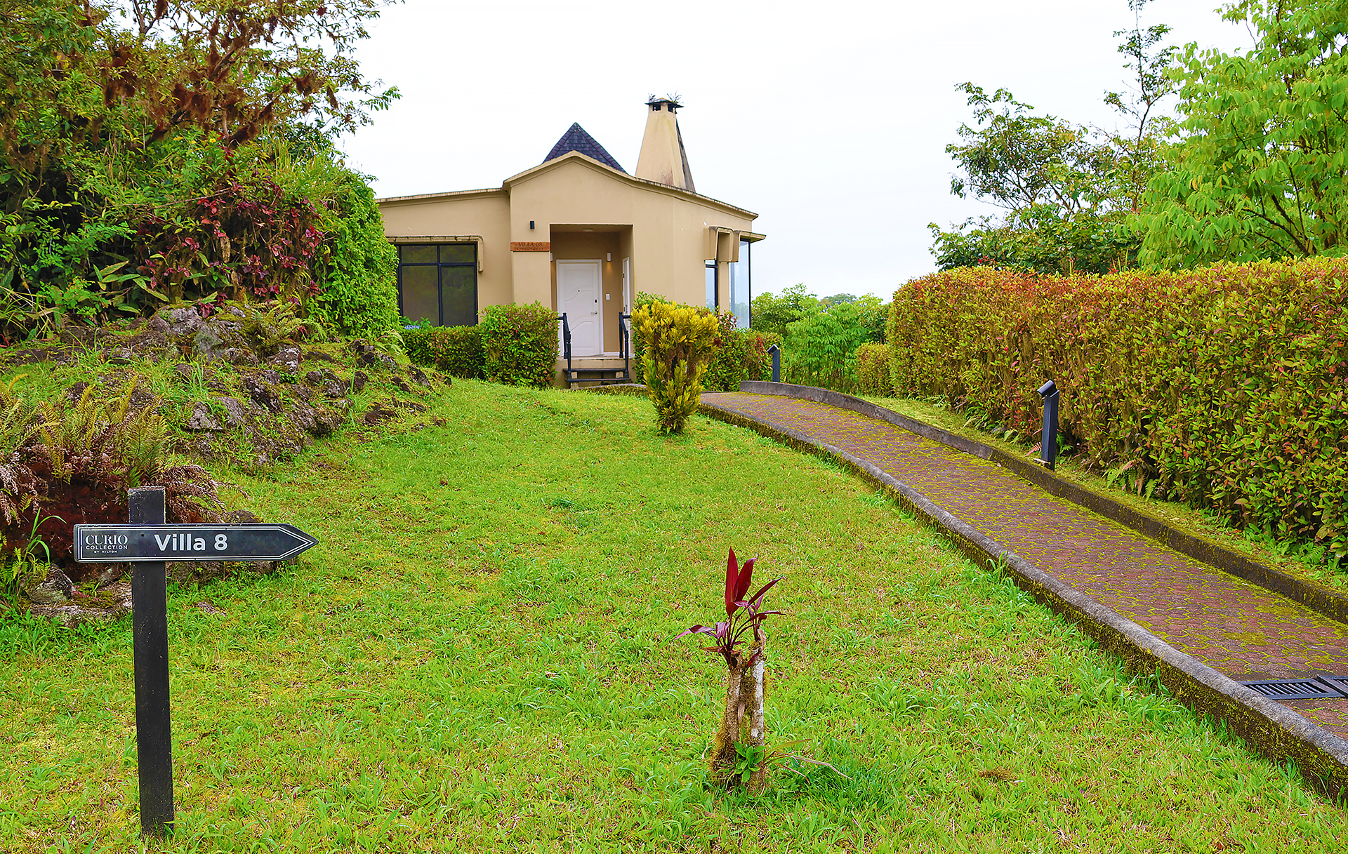 a house with a lawn and a path