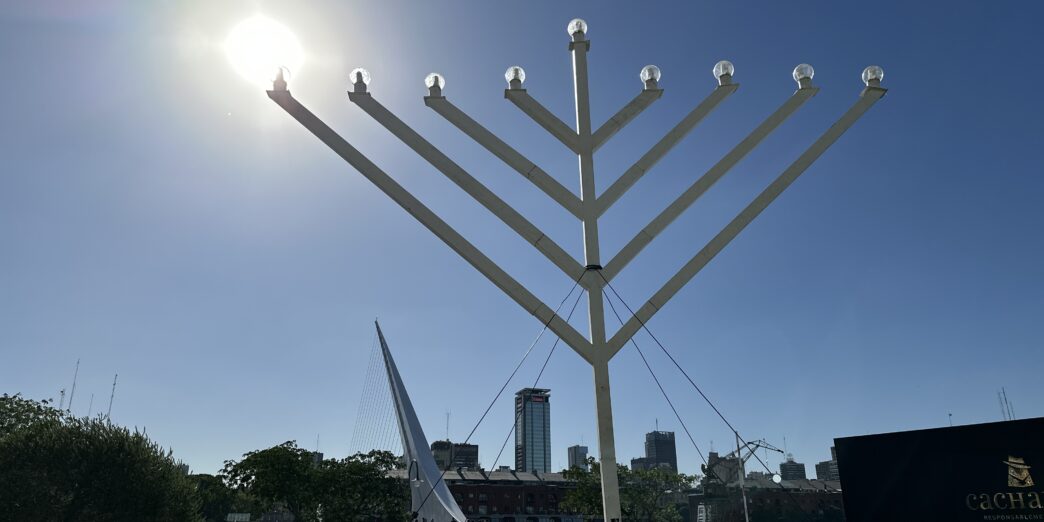 a large white structure with lights on it