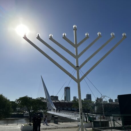a large white structure with lights on it