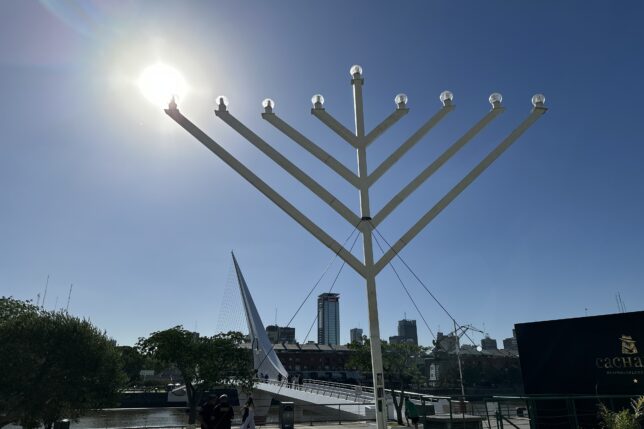 a large white structure with lights on it